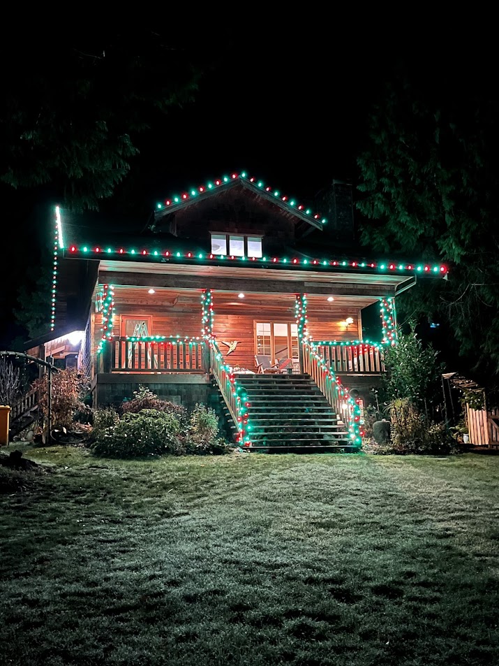 Green and red Christmas light installation Roberts Creek BC